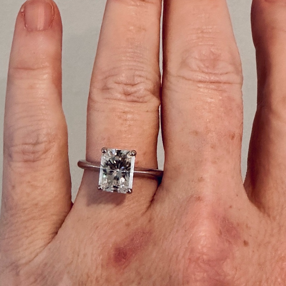 Stunning Radiant Cut 14k white gold engagement ring.